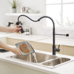black high-arc kitchen faucet with sprayer